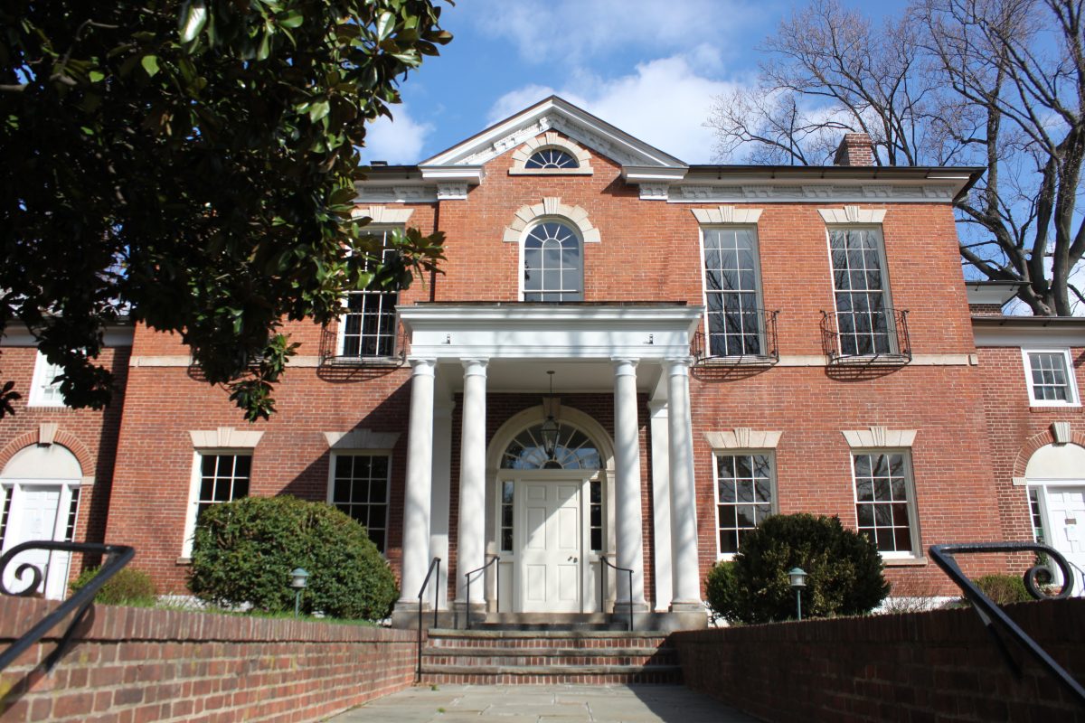 a mansion with red brick walls