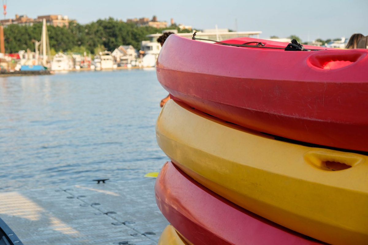 kayaks stacked up near the river