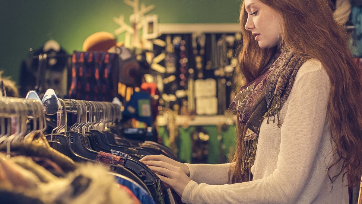 a woman shopping for clothes