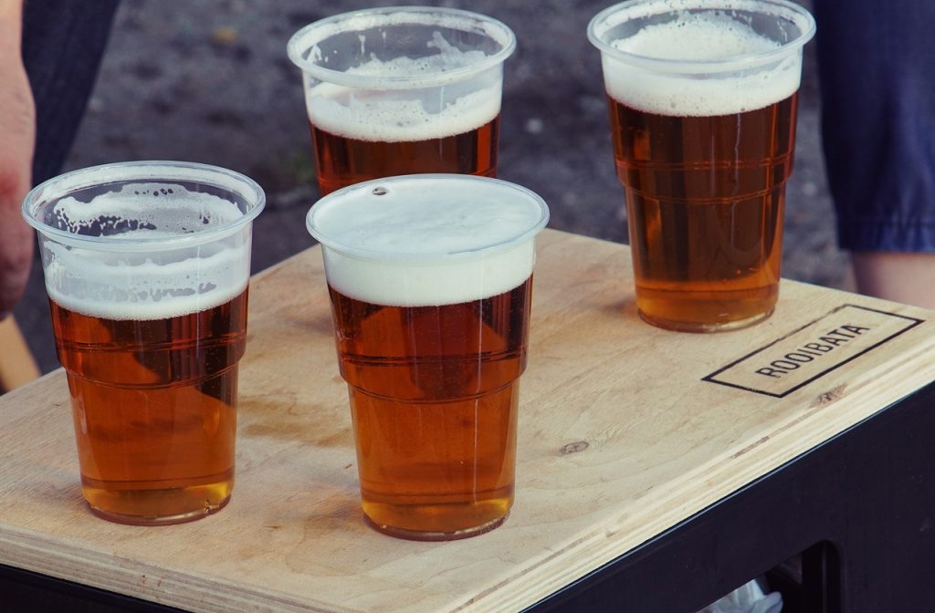 Plastic cups of beer Plastic cups of beer