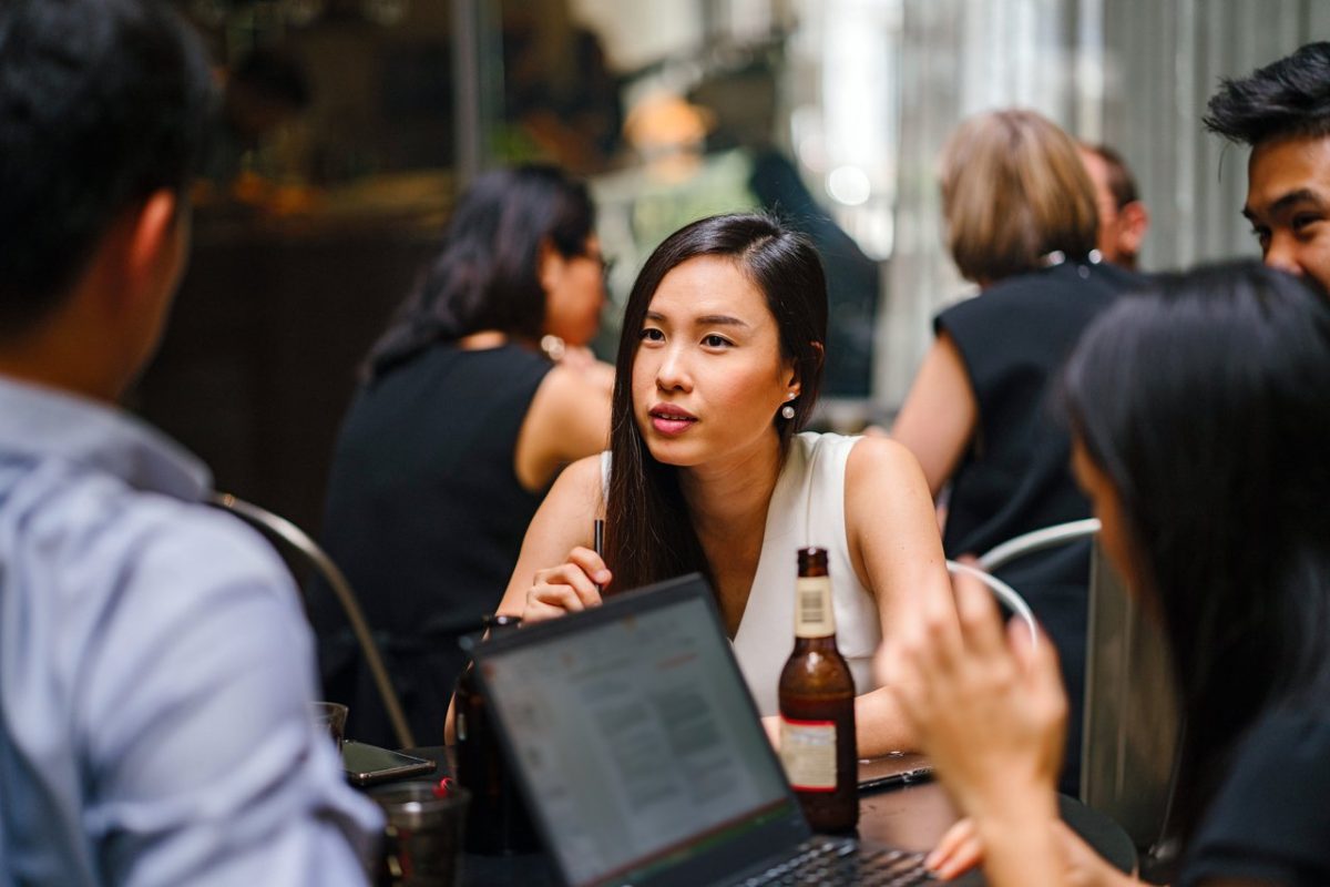 a woman avoiding culture shock by paying attention to the speaker