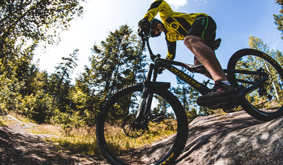 Mountain biking Man descending down on a mountain bike
