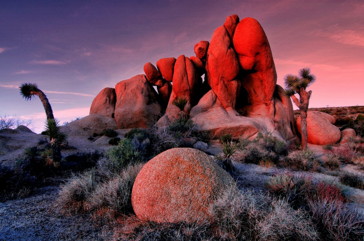 a car camping site with a majestic view of unique rock formation