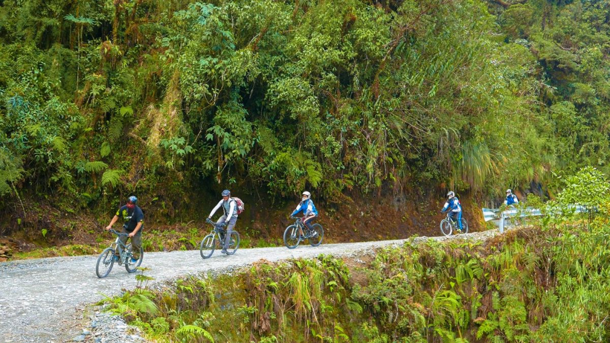 cyclists at the Death Road in Bolivia cyclists at the Death Road in Bolivia