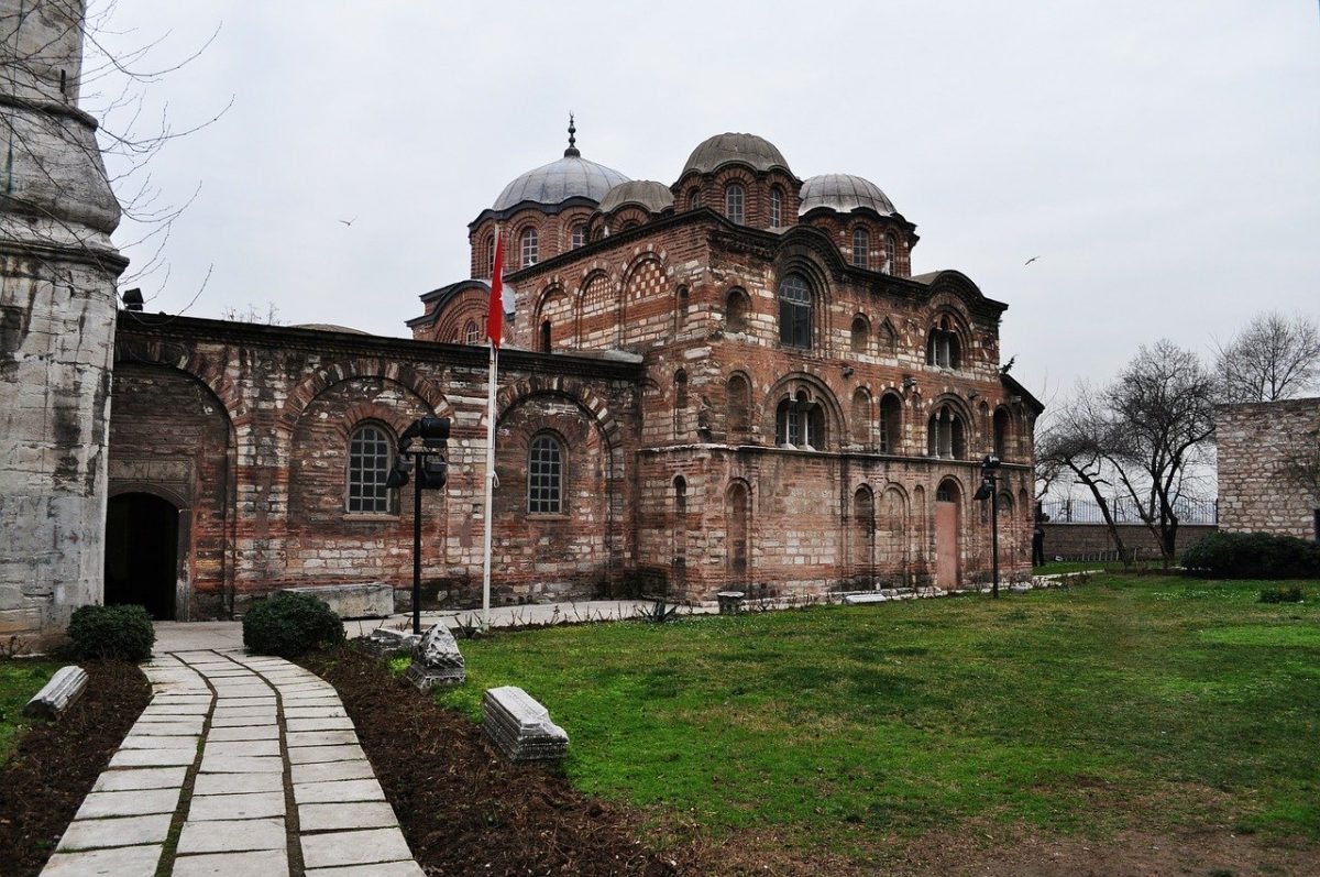 an imposing brick building with domes an imposing brick building with domes