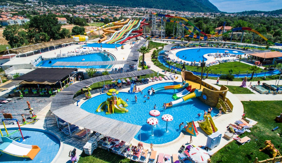 a vast waterpark filled with pools and slides a vast waterpark filled with pools and slides