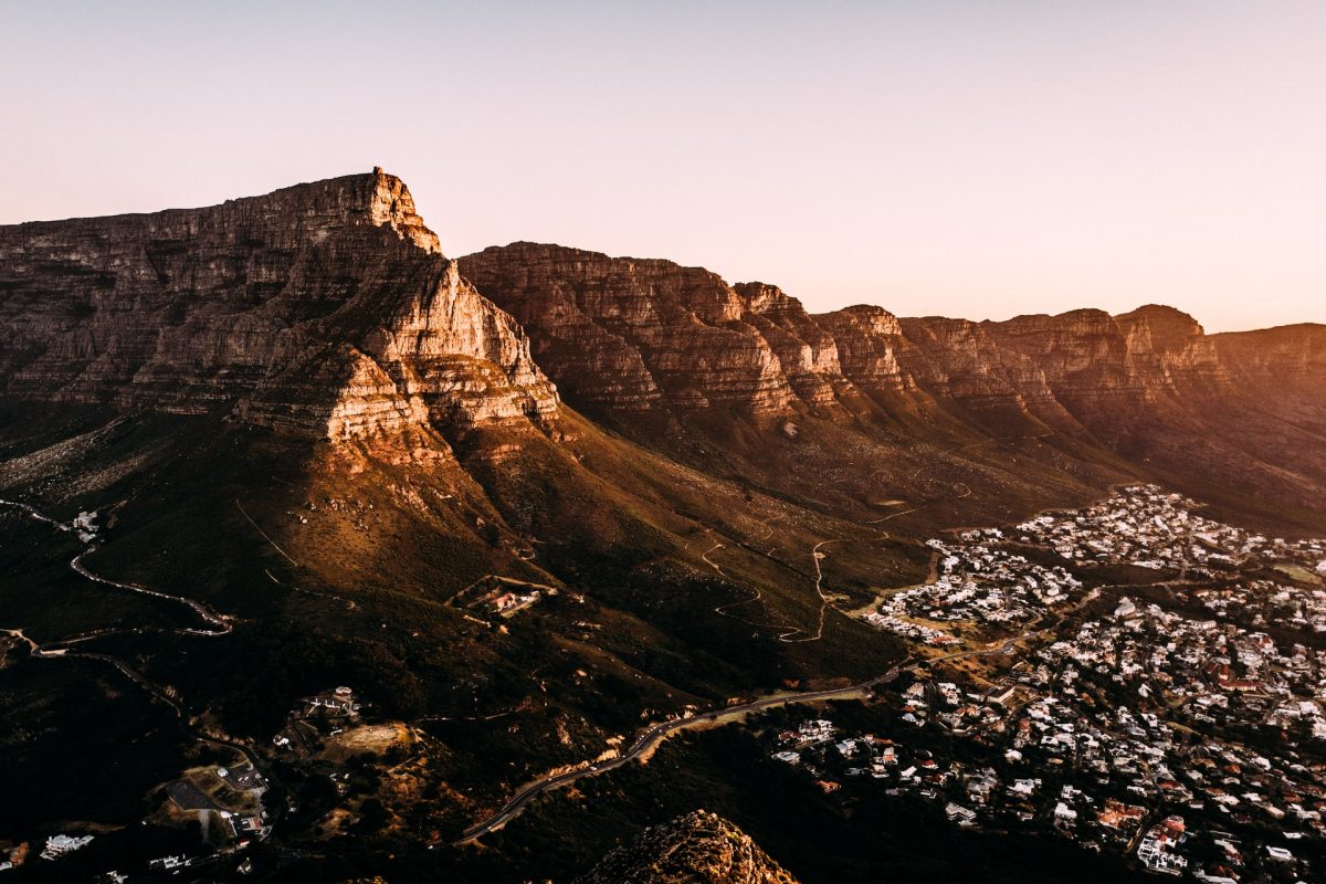 sunrise slowly illuminating the mountains of capetown