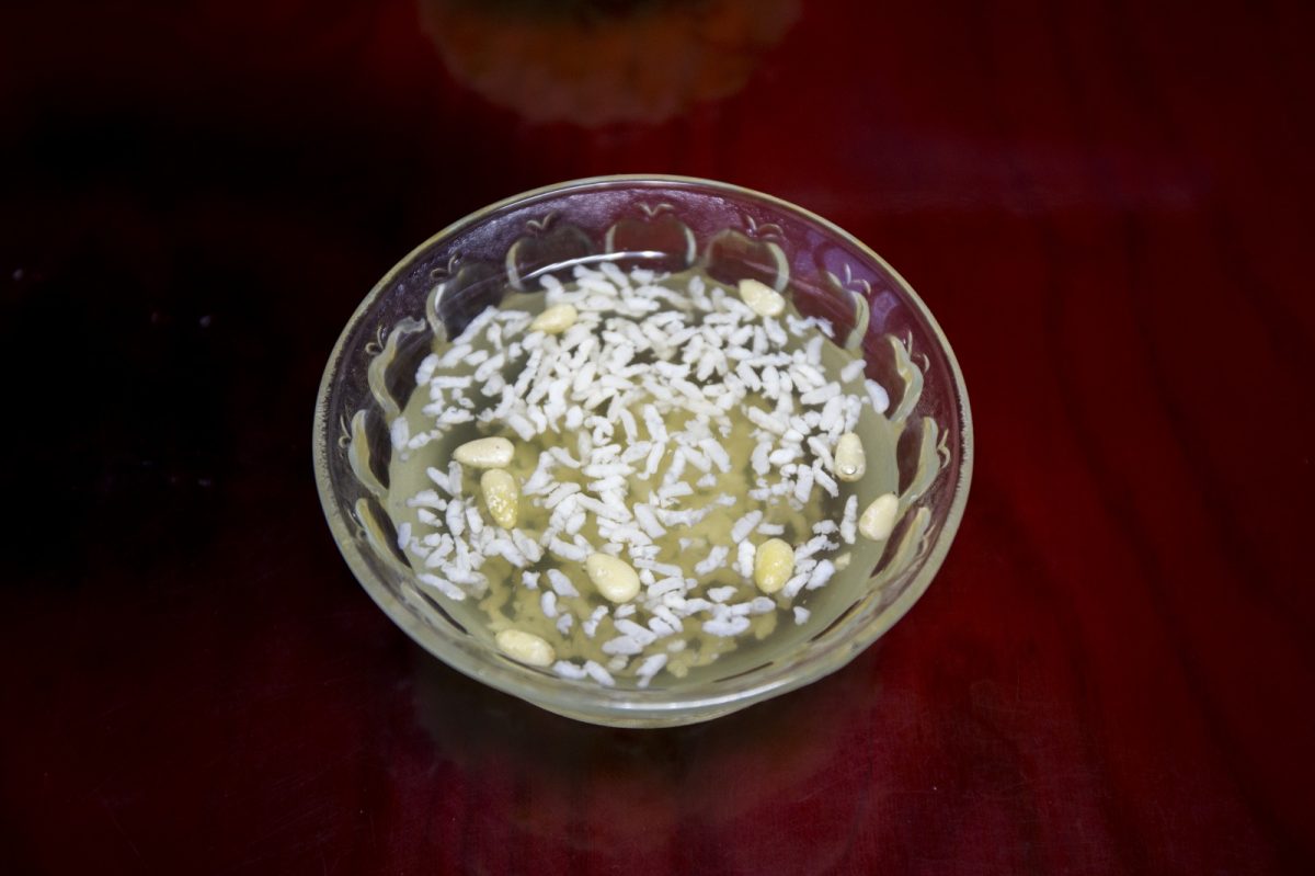A cup of Sikhye with rice A cup of Sikhye with rice