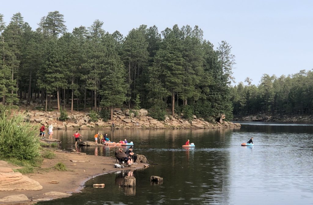 Visitors tubing and swimming at Woods Canyon Lake