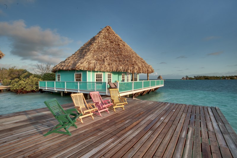 View of Coco Plum Caye Resort's dock with Overwater Villa