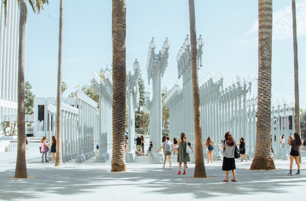 Visitors at LACMA's iconic street lamp exhibition