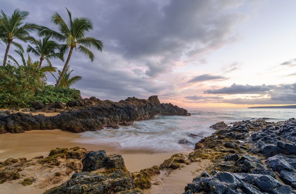 Rocky shores at a secret beach in Maui, one of the best places to visit in November Rocky shores at a secret beach in Maui, one of the best places to visit in November