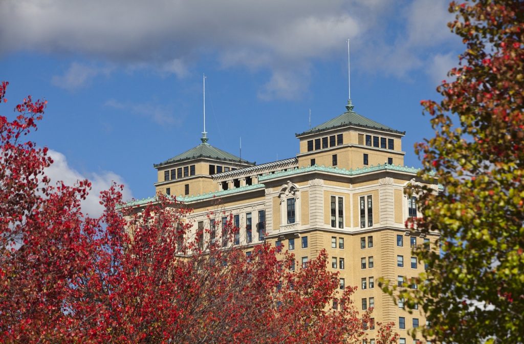 Building in Michigan framed by the fall colors Building in Michigan framed by the fall colors