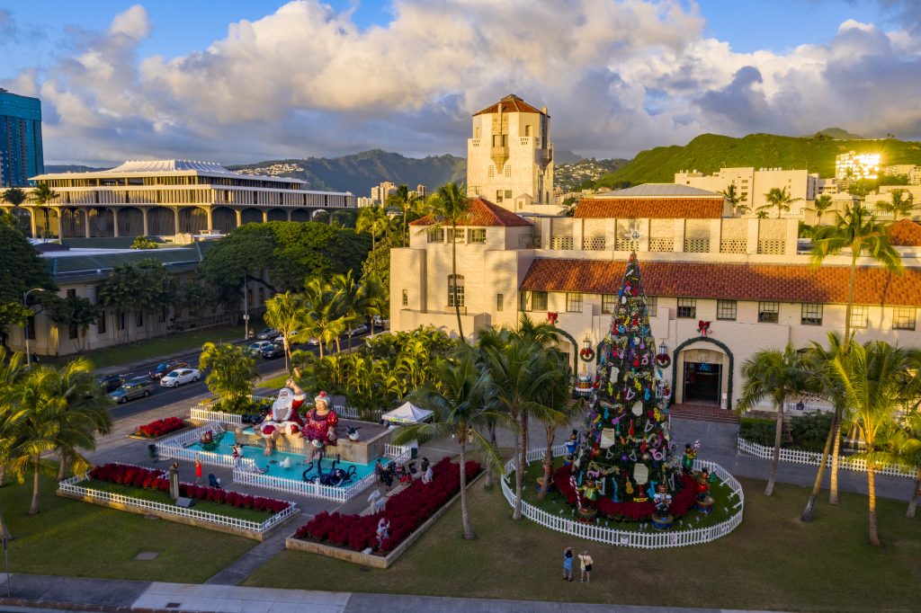 Honolulu Hale bedecked with Christmas decorations during dusk