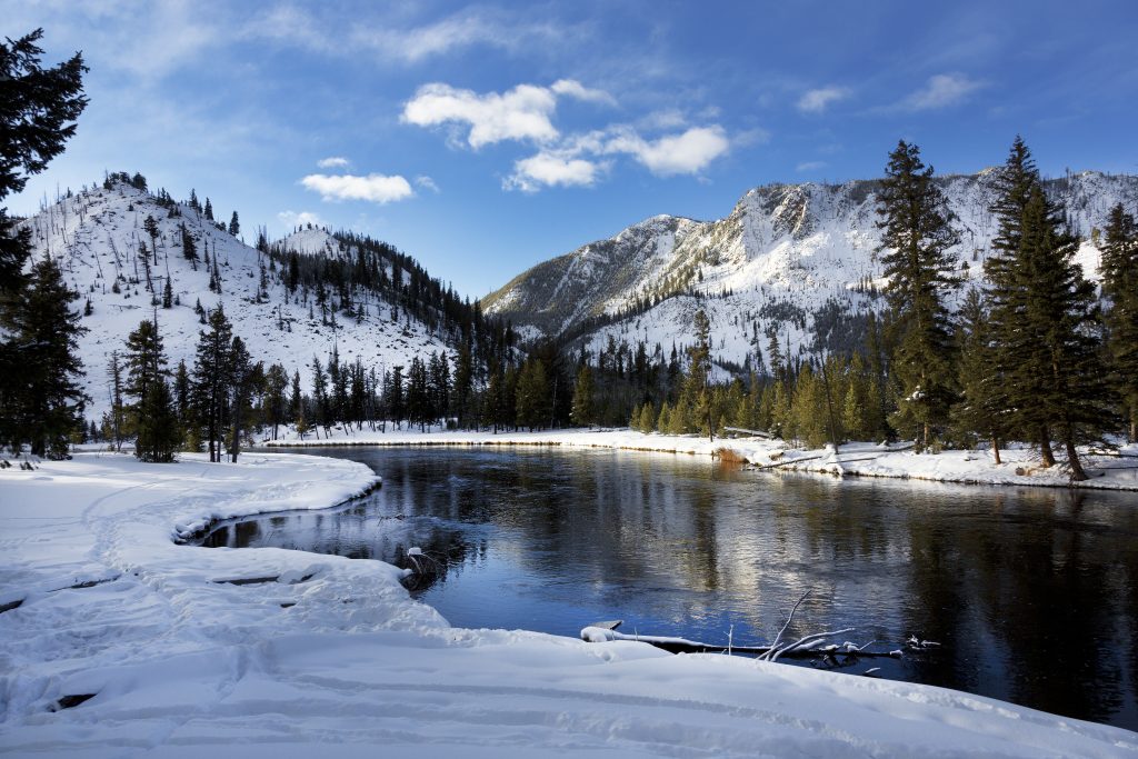 Landscape view of the snowy Yellowstone National Park mountains in Wyoming