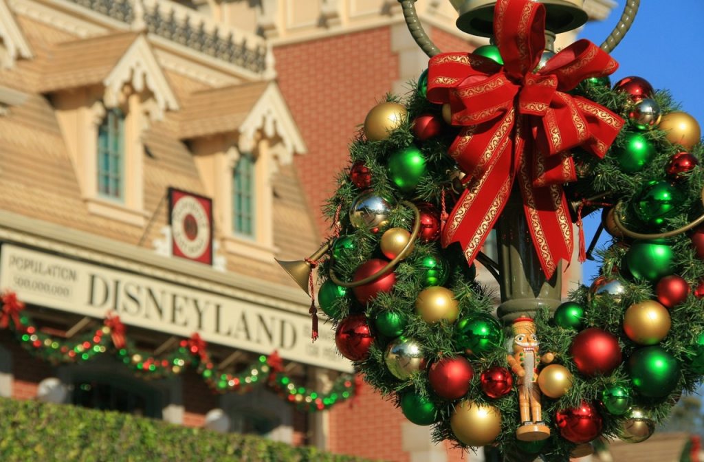 Christmas wreath with Disneyland signage in Main Street