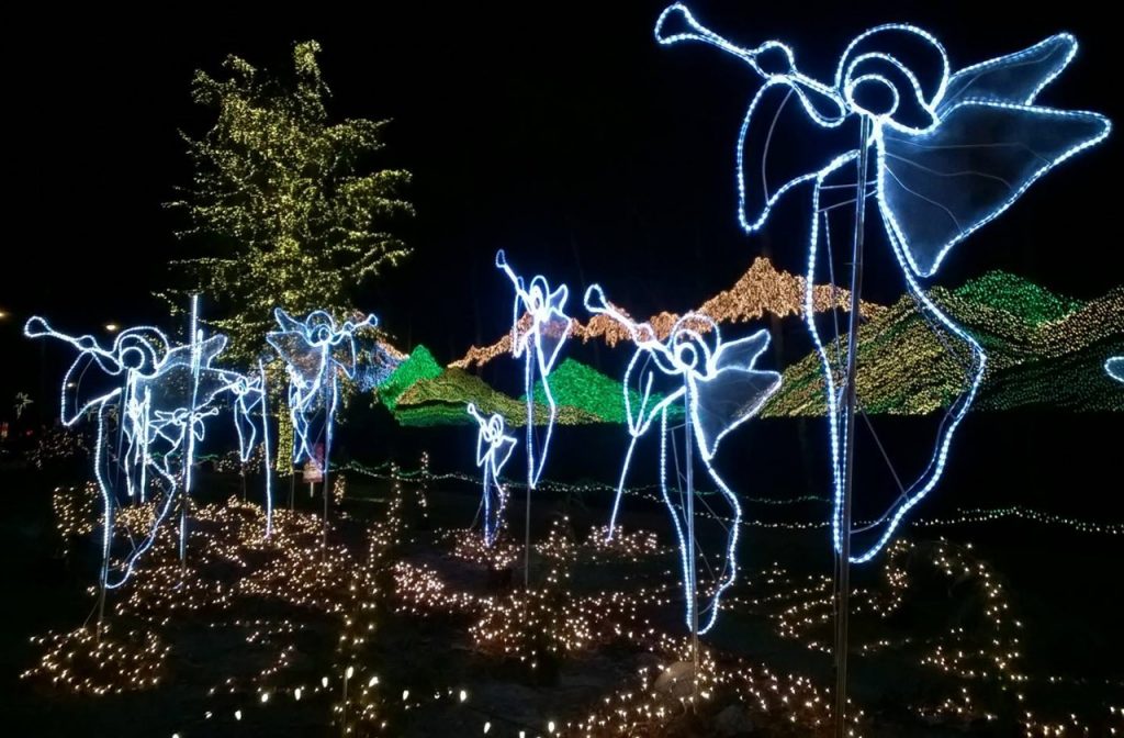 Christmas lights shaped into angels playing the trumpet at The Lights of Christmas
