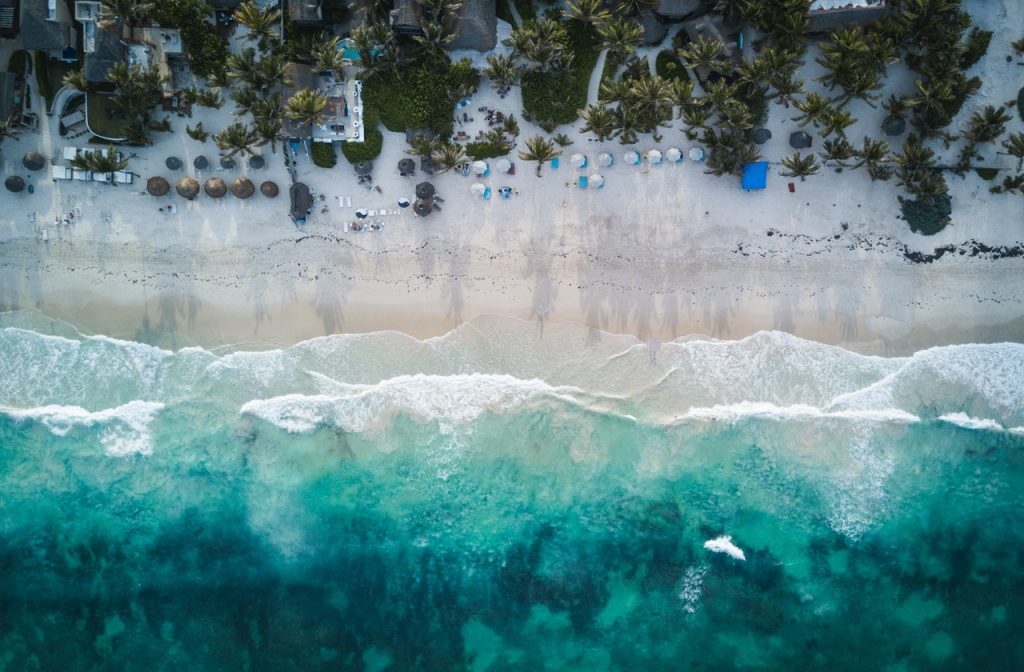 Aerial view of Tulum's white sands and pristine waters