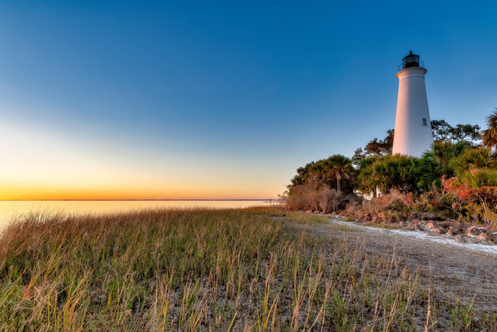 Perspective view of the St. Marks Lighthouse from the ground during sunset. Perspective view of the St. Marks Lighthouse from the ground during sunset.