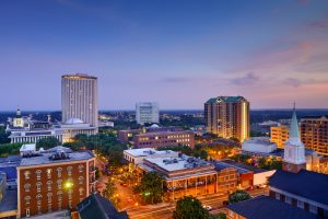 Aerial view of downtown Tallahassee at dusk.
