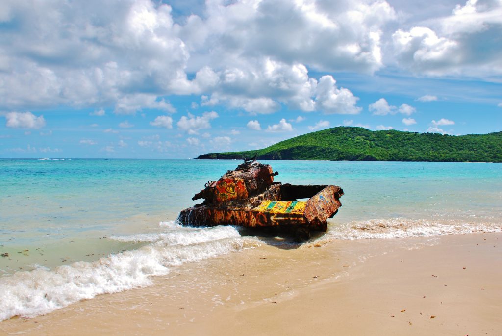 Old military tank along the shores of Flamenco Beach in Culebra, Puerto Rico, one of the best places to travel without a passport.