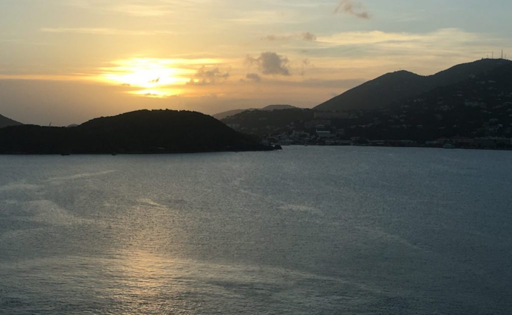 Watch the sunset over Secret Harbor Beach, one of the romantic things to do in St Thomas.