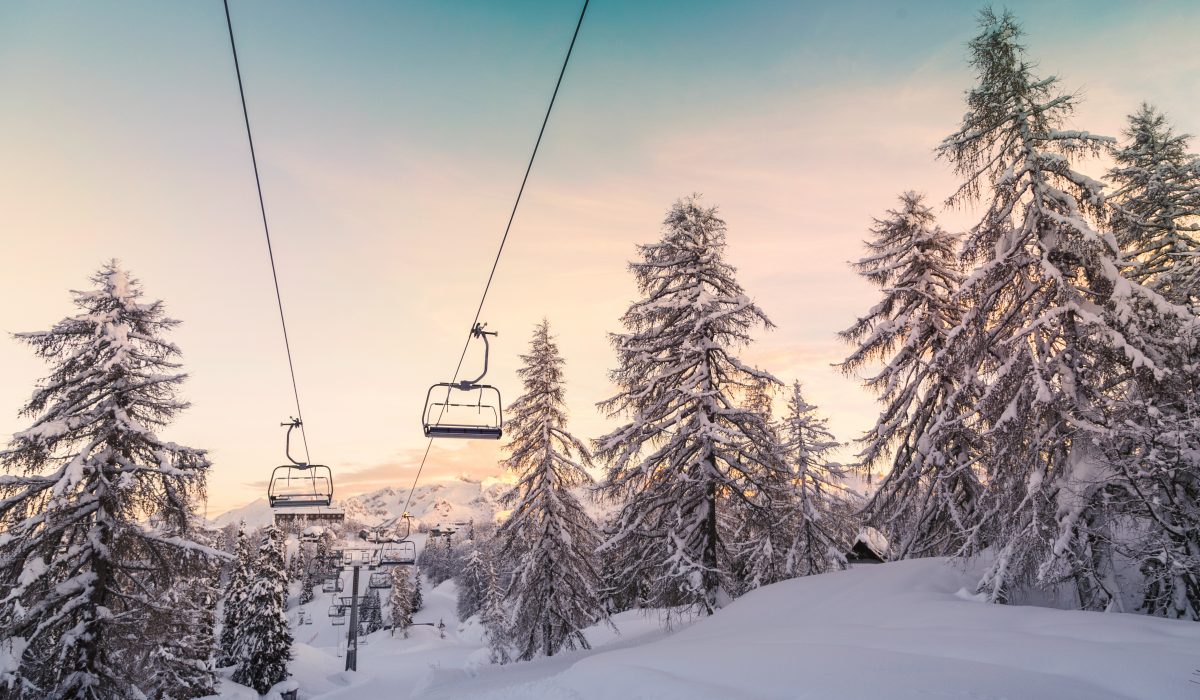 Ski center of Vogel Julian Alps, Slovenia Snow covered mountain slopes with ski lifts.