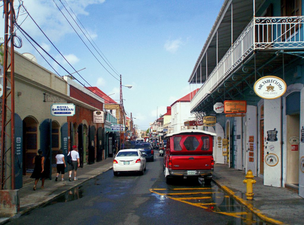 People shopping along Main Street lined up with shops in Charlotte Amalie, one of the best things to do in St Thomas.