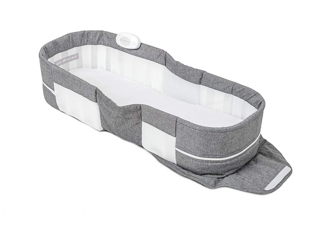 Baby Delight Snuggle Nest in gray, a travel bassinet for baby.