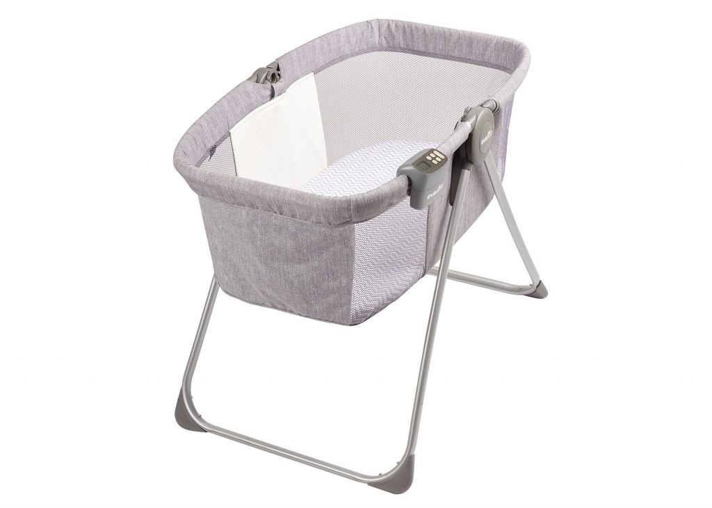 Evenflo Loft Portable Bassinet in gray, a travel bassinet with a built-in speaker, nightlight, and room temperature monitor.