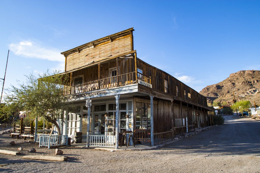 Wooden exterior of the Oatman Museum in Oatman, one of the ghost towns in Arizona.