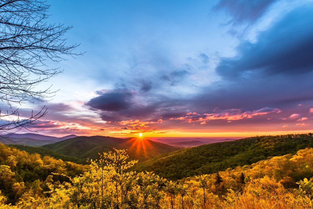 View of sunrise over mountains at Shenandoah National Park in May.