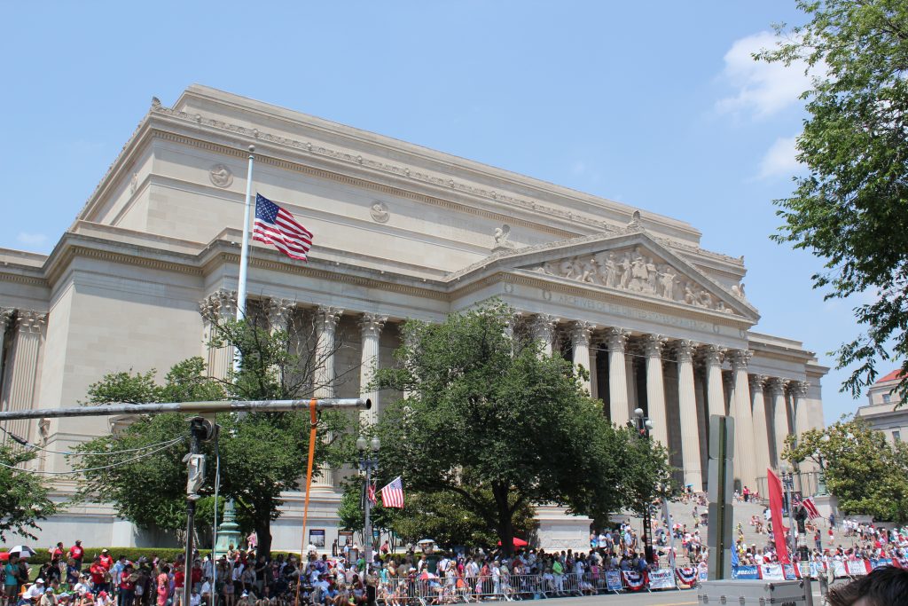 Crowds of people watching the Memorial Day parade at Washington D.C.