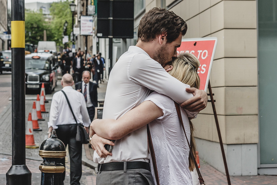 A loving embrace shared by two people.
