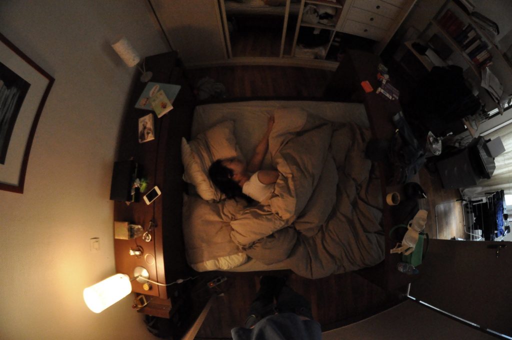 A woman sleeping and taking her time to rest.