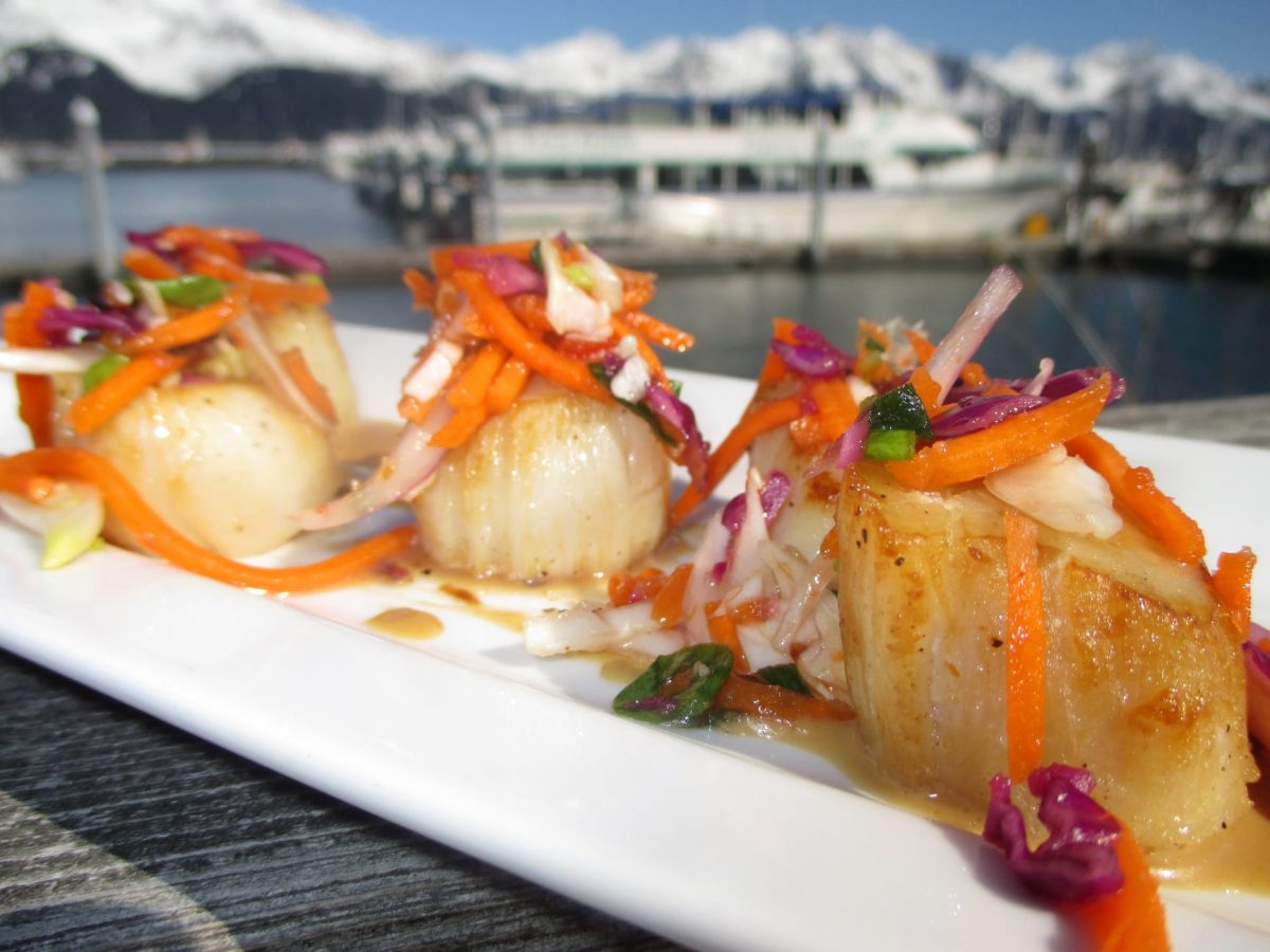 Seafood dish from Ray's Waterfront with the Seward harbor in the background.