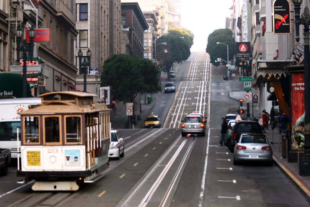 Powell Street at Union Square in Downtown San Francisco with the tram system in view.