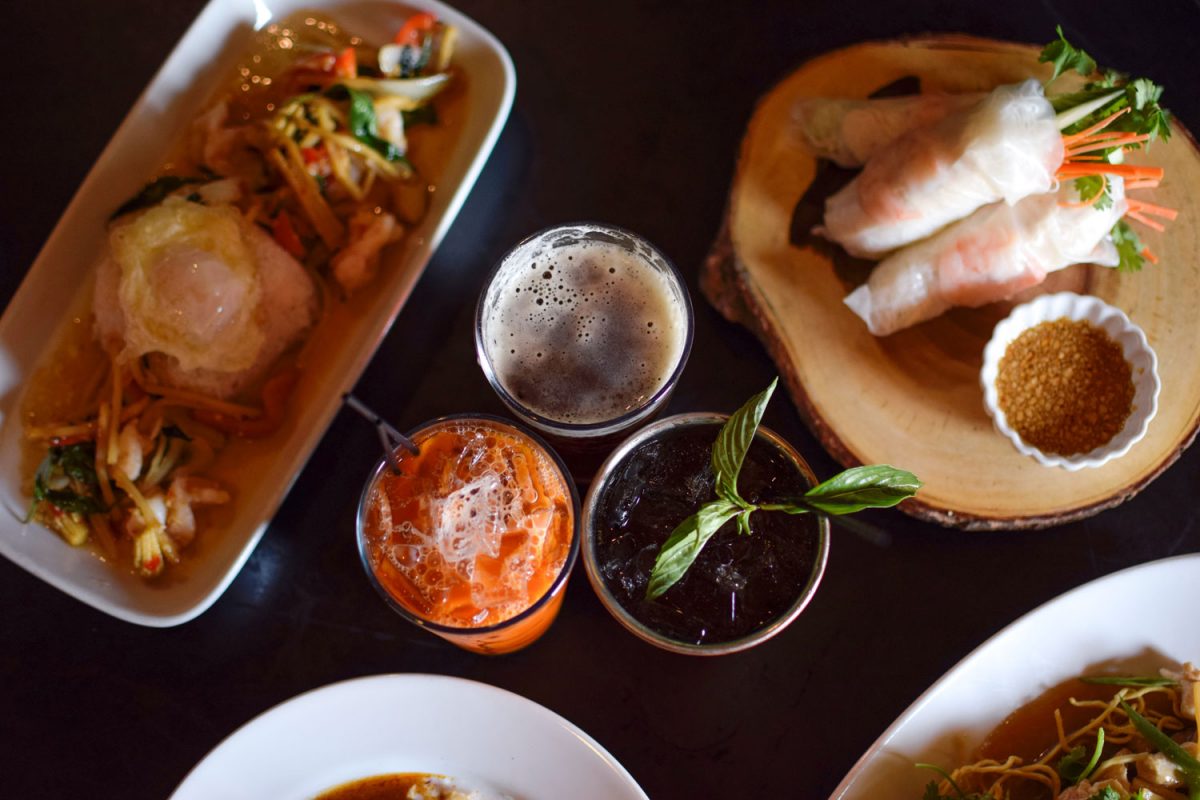 Top-shot of dishes and drinks from Woody's Thai Kitchen.