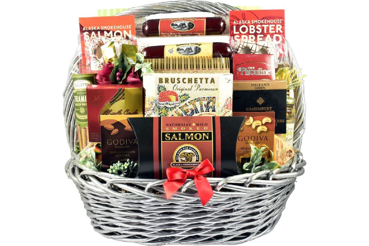 Gift basket filled with Alaska delicacies like smoked salmon, sausages, and spread, one of the best souvenirs from Alaska.