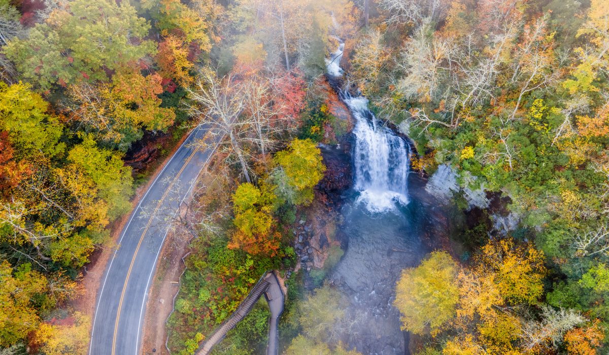 Aerial view of Asheville covered in fall colors, one of the best fall vacations in the US.