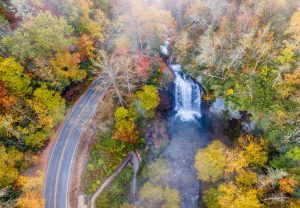 Aerial view of Asheville covered in fall colors, one of the best fall vacations in the US.