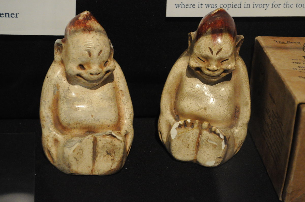 Two Billikens from the Alaska–Yukon–Pacific Exposition of 1909.