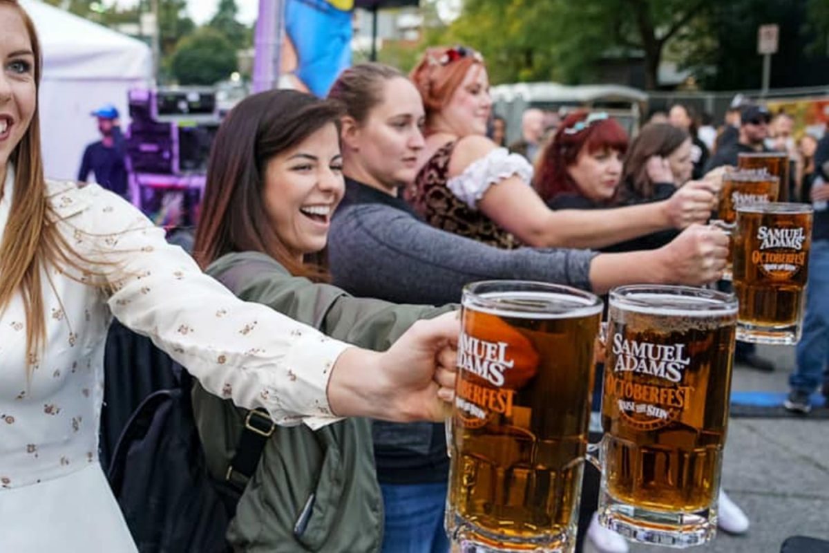 Women holding beer steins during Hudson Valley Oktoberfest. 