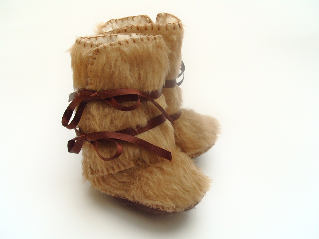 Alaskan Mukluks with trimmed fur and ribbons, one of the best souvenirs from Alaska.