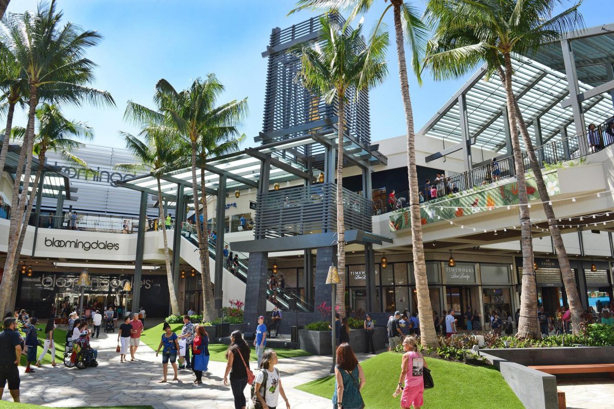 people strolling along the grounds of ala moana center in honolulu.