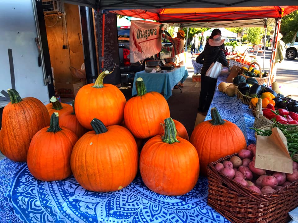 pumpkins and other seasonal produce on display at the aspen saturday market during october.