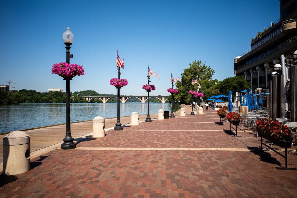 cobble stone pathway with flowered lamp posts at george town washington