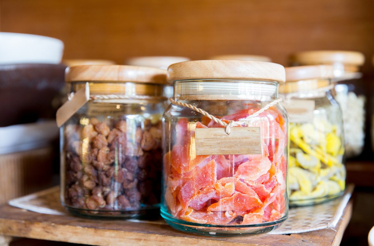 small jars with crack seeds inside, one of the top Hawaii treats to buy as souvenirs.