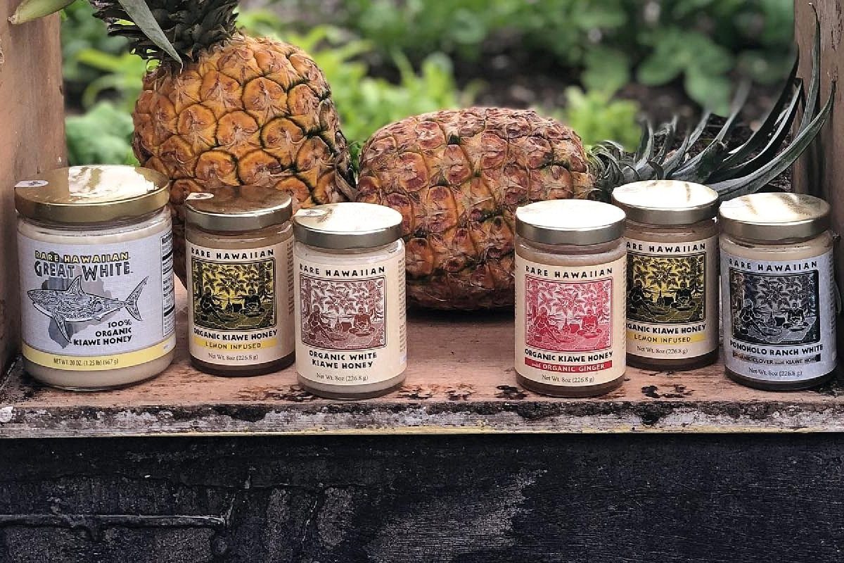 bottles of hawaiian honey, infused with different flavors.