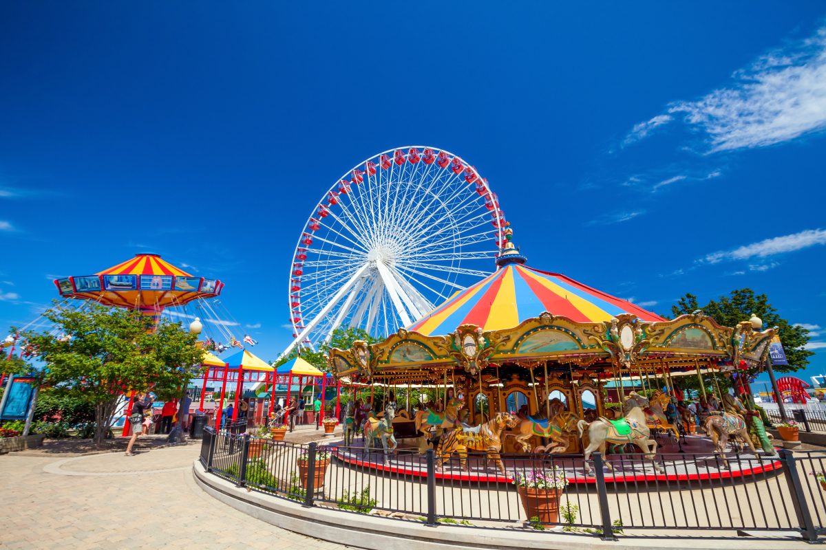 carousel and ferris wheel at the navy pier in chicago, one of the best places to visit in october in the usa.